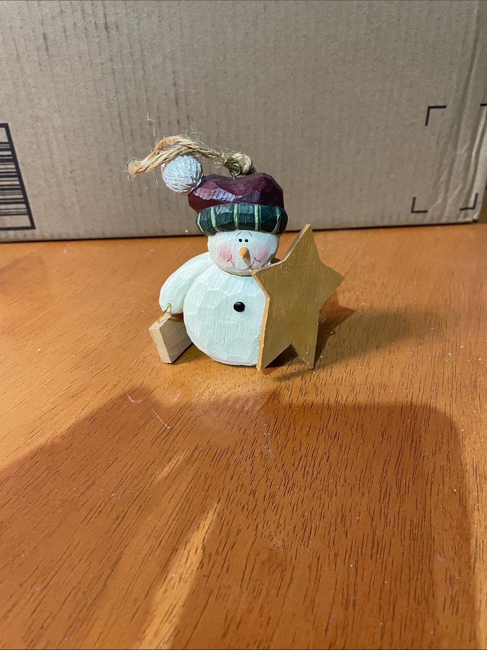 Handpainted Wooden Snowman Ornament with Gold Star